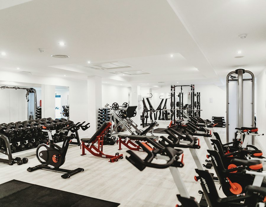 Personal trainer guiding a client through a workout session